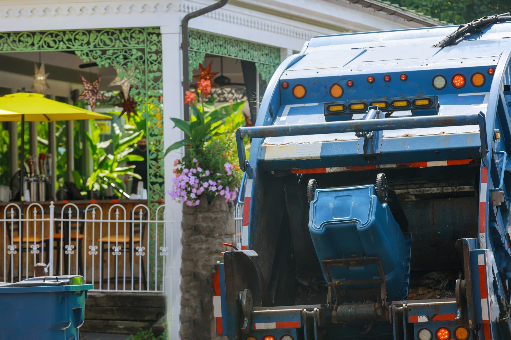 Urban municipal recycling garbage collector truck waste trash bin